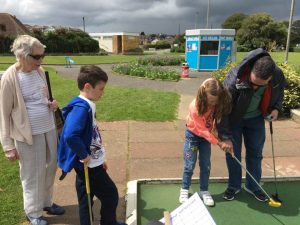 Clouds looming over a game of crazy golf